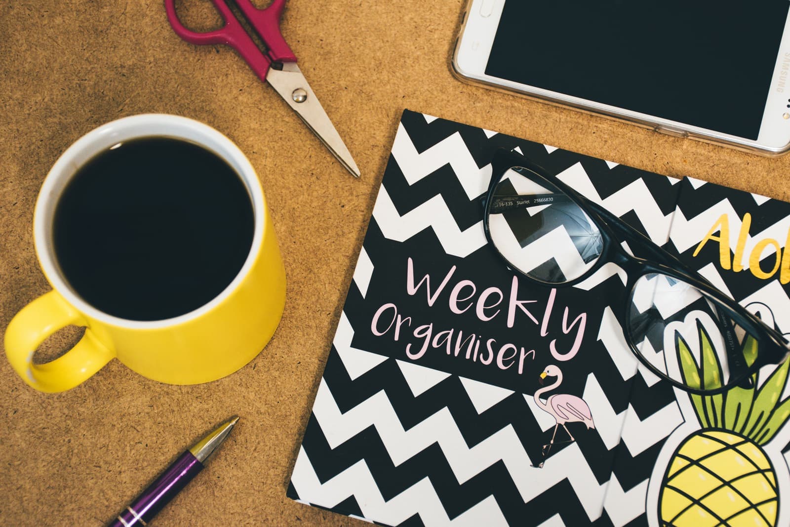 Organized office supplies and stationery arranged on a desk