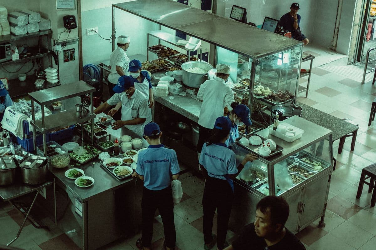 Commercial restaurant kitchen with supplies on shelves