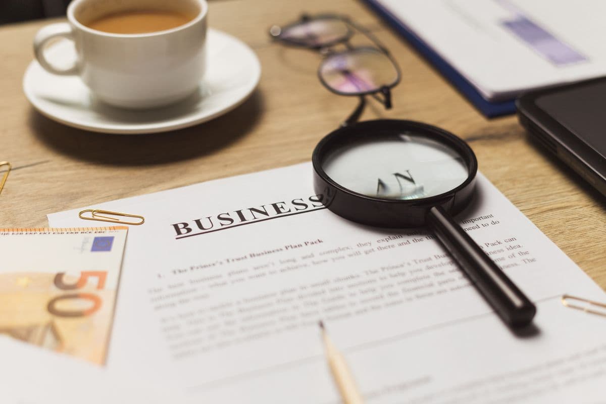 Business documents being checked on a desk